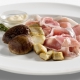 Porcini dorati con prosciutto di Sauris IGP Nonno Bepi